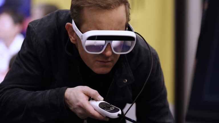 News24 National Affairs Correspondent Jonathan Lea wearing smart glasses in Artificial Intelligence: Who's in Control?