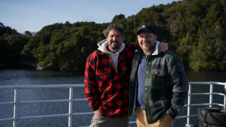 Colin Fassnidge and Manu Feildel together aboard a boat
