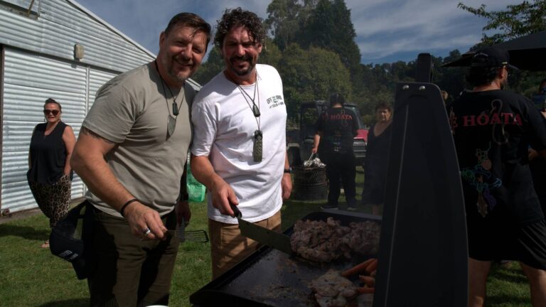 Colin Fassnidge and Manu Feildel cooking at an outdoor grill in Off the Grid on Channel 7