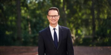 Peter Rice in an official portrait outdoors