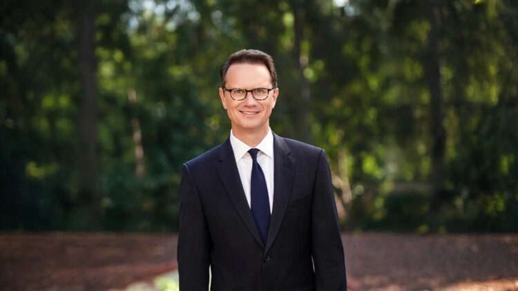 Peter Rice in an official portrait outdoors