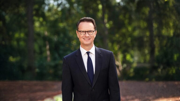 Peter Rice in an official portrait outdoors