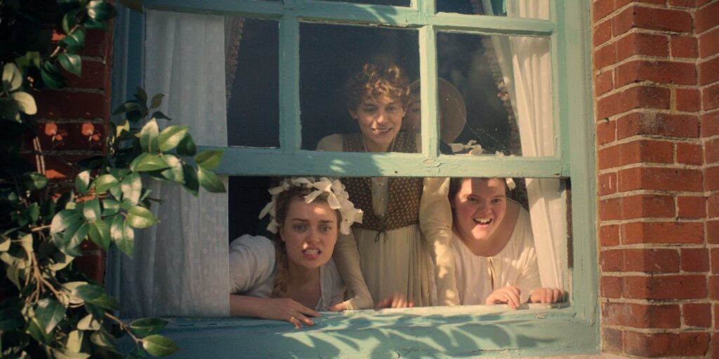 Faces at the window of Longbourn in the new Netflix series