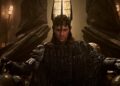 Charlie Vickers as Sauron on his throne in The Lord of the Rings: The Rings of Power season 3