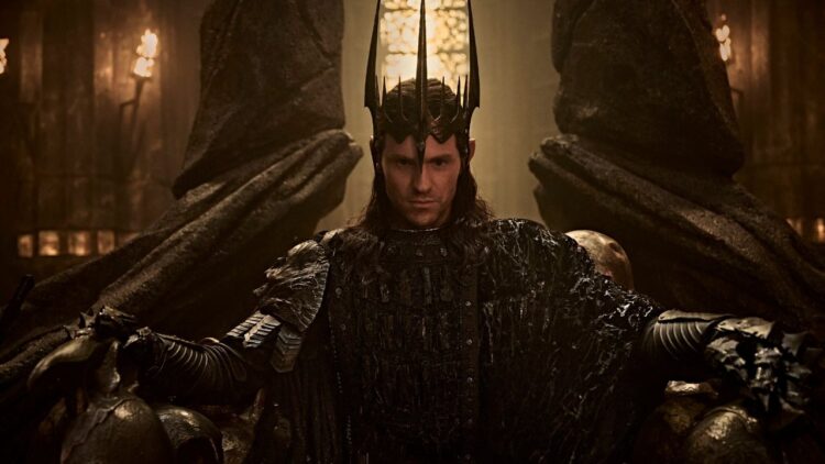 Charlie Vickers as Sauron on his throne in The Lord of the Rings: The Rings of Power season 3