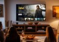 People watching the Prime Video app on a television, displaying Fallout
