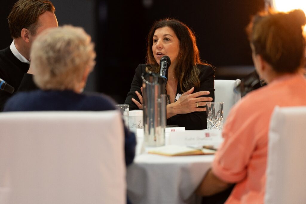 A participant speaks at the PRISM 2026 screen export forum