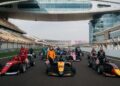 F1 ACADEMY drivers at a race circuit, featured for The Pursuit documentary special