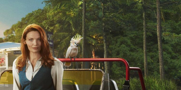 Anna Samson as Mackenzie Clarke beside a red vehicle and cockatoo in Return to Paradise season three