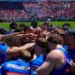 Newcastle Knights players gather in a team huddle