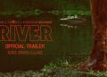 A figure stands at the water’s edge in the River trailer key art
