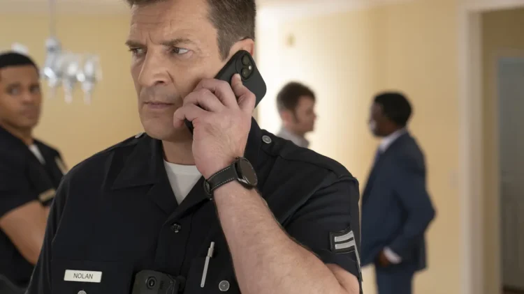 John Nolan on the phone in The Rookie season eight episode sixteen