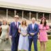 Seven's spring racing presenters with two horses at a racecourse