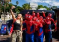 Spider-Man fans take a group selfie at the Circular Quay fan event in Sydney