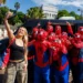 Spider-Man fans take a group selfie at the Circular Quay fan event in Sydney