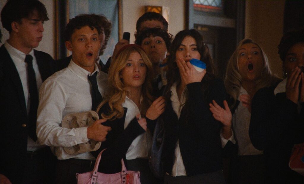 Students react in shock at a party in The Body on Netflix