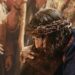 Jonathan Roumie as Jesus carrying the cross in The Chosen season 6 artwork