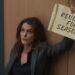 Keri Russell holds a Renewed for Season 5 sign for The Diplomat on Netflix