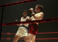 Jaalen Best as Cassius Clay boxing in the ring in The Greatest