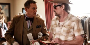 Ethan Hawke and another cast member in a scene from The Lowdown