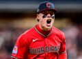 Australian baseball player Travis Bazzana celebrates in a Cleveland Guardians uniform