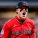 Australian baseball player Travis Bazzana celebrates in a Cleveland Guardians uniform