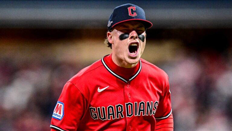 Australian baseball player Travis Bazzana celebrates in a Cleveland Guardians uniform