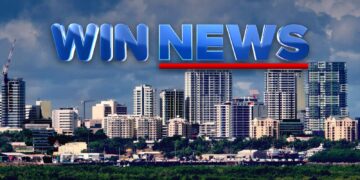 WIN News logo over the Darwin city skyline